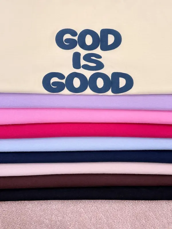 تیشرت اورسایز پنبه رنگی طرح GOD IS GOOD آلما